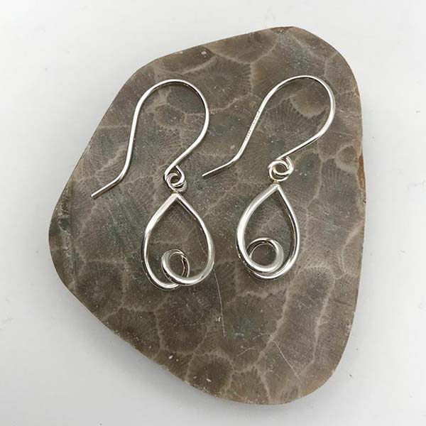 Handcrafted silver earrings inspired by organic shapes found in nature