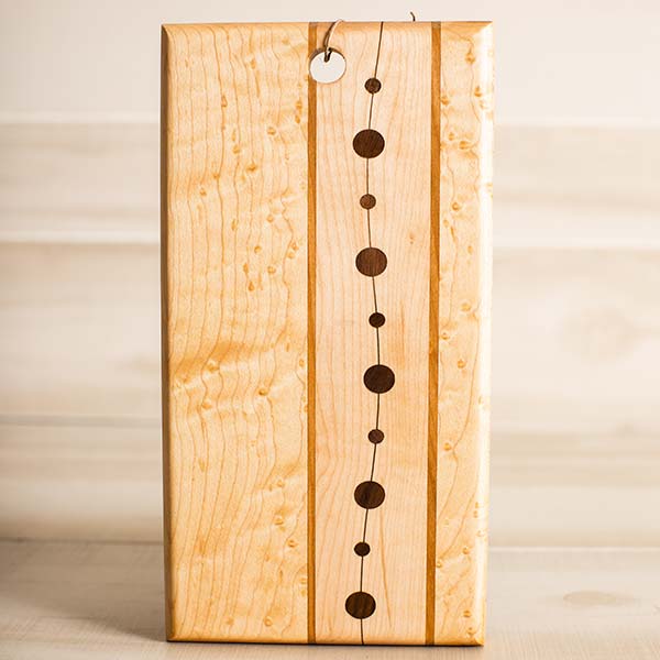Birdseye Maple cutting board with inlaid woods